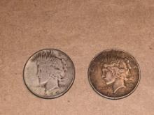 (2) 1924 and 1934 Peace Silver Dollars