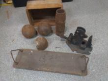 Steel mortar shell casing, Cast iron ball, Bethlehem jack, and wood swing seat lot