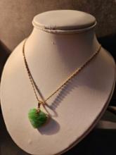Lady's heart shaped green glass pendent