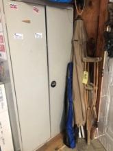 metal storage cabinet, contents, umbrella