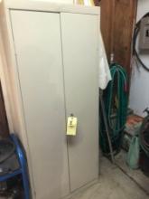 Metal storage cabinet and contents
