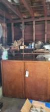 Contents of corner of garage, large 2 door cabinet, hedge trimmer, tools, power painter, shelves