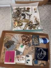 2 boxes of costume jewelry, necklaces, rings and more