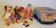 Small tote of assorted Disney toys, troll dolls, modern porcelain head doll