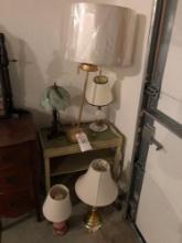 five lamps and small stand