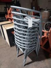 Stack of 11 Gray Metal Chairs