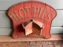 Wooden "Hot Pie" sign, old kitchen items.