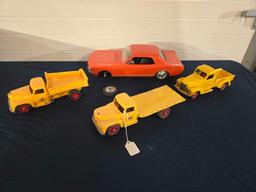 Assorted Toy Trucks and Car