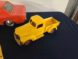 Assorted Toy Trucks and Car