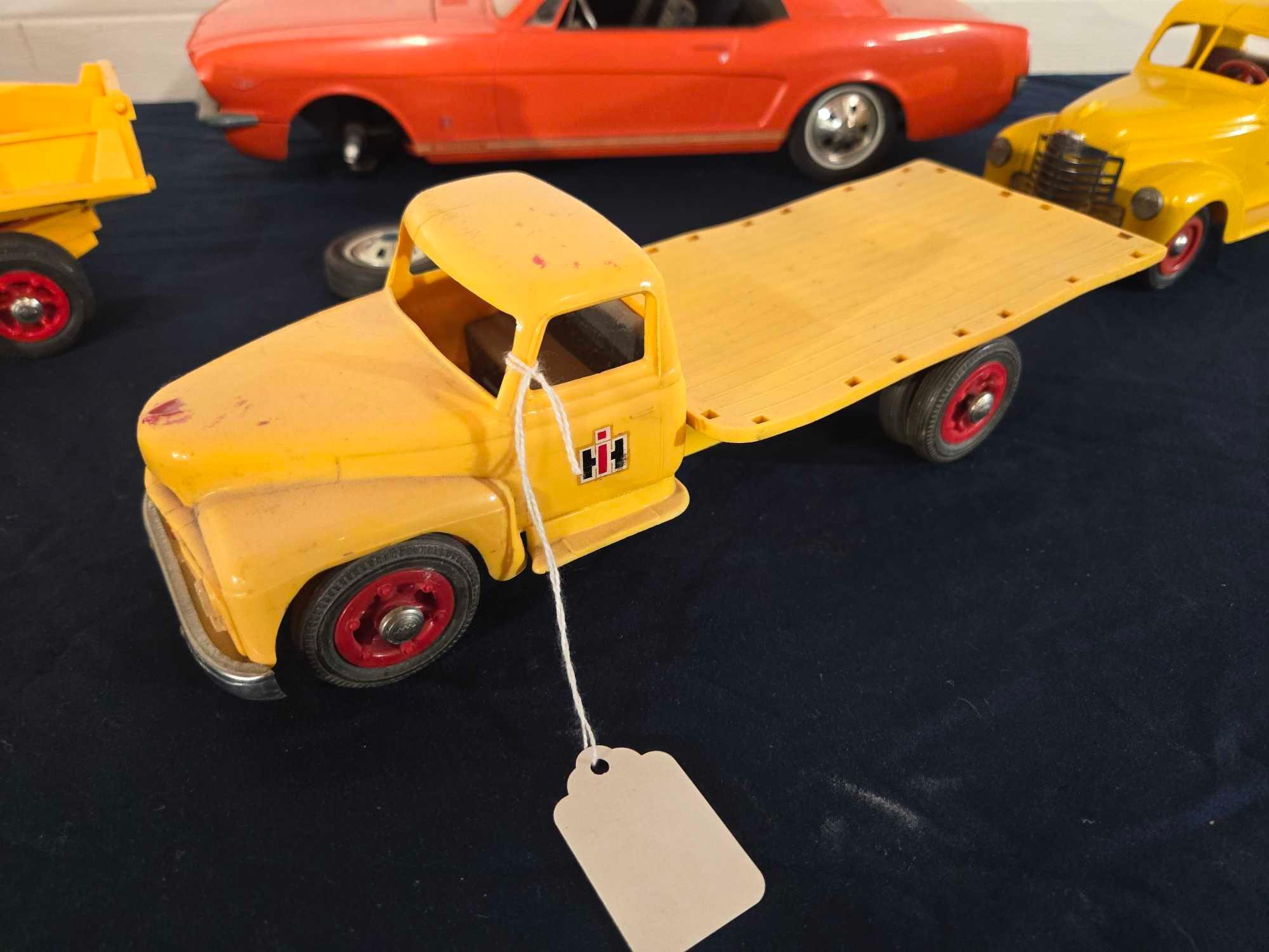 Assorted Toy Trucks and Car