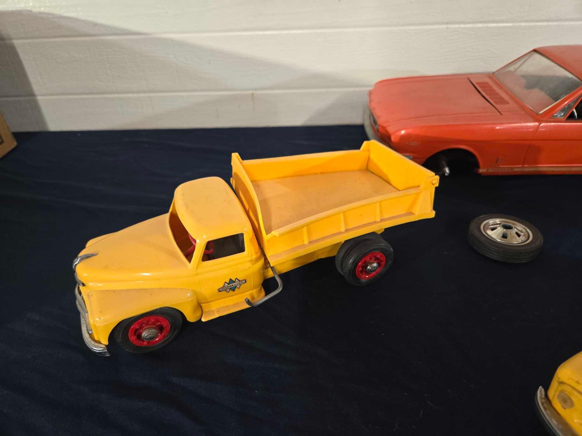 Assorted Toy Trucks and Car