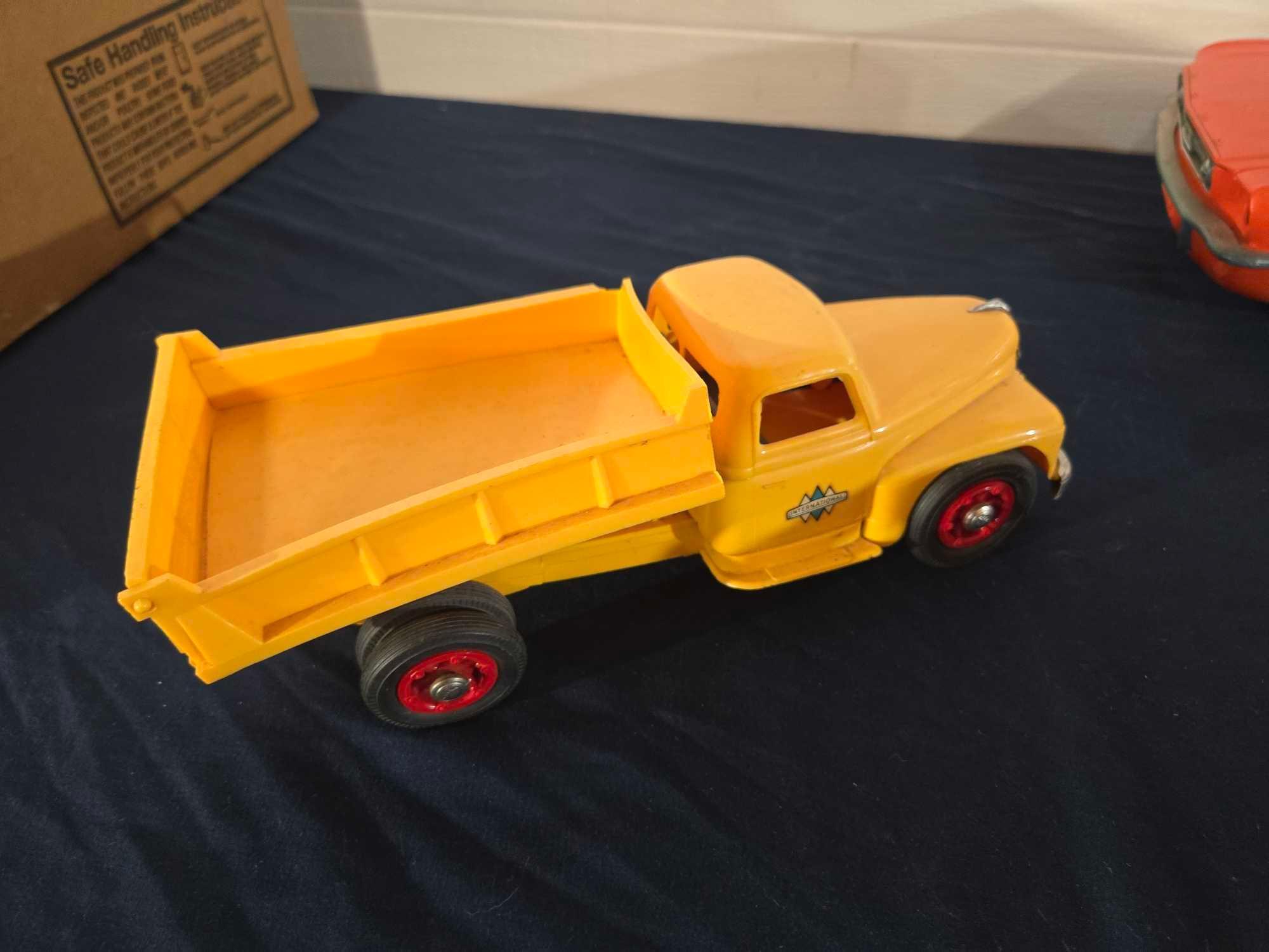 Assorted Toy Trucks and Car