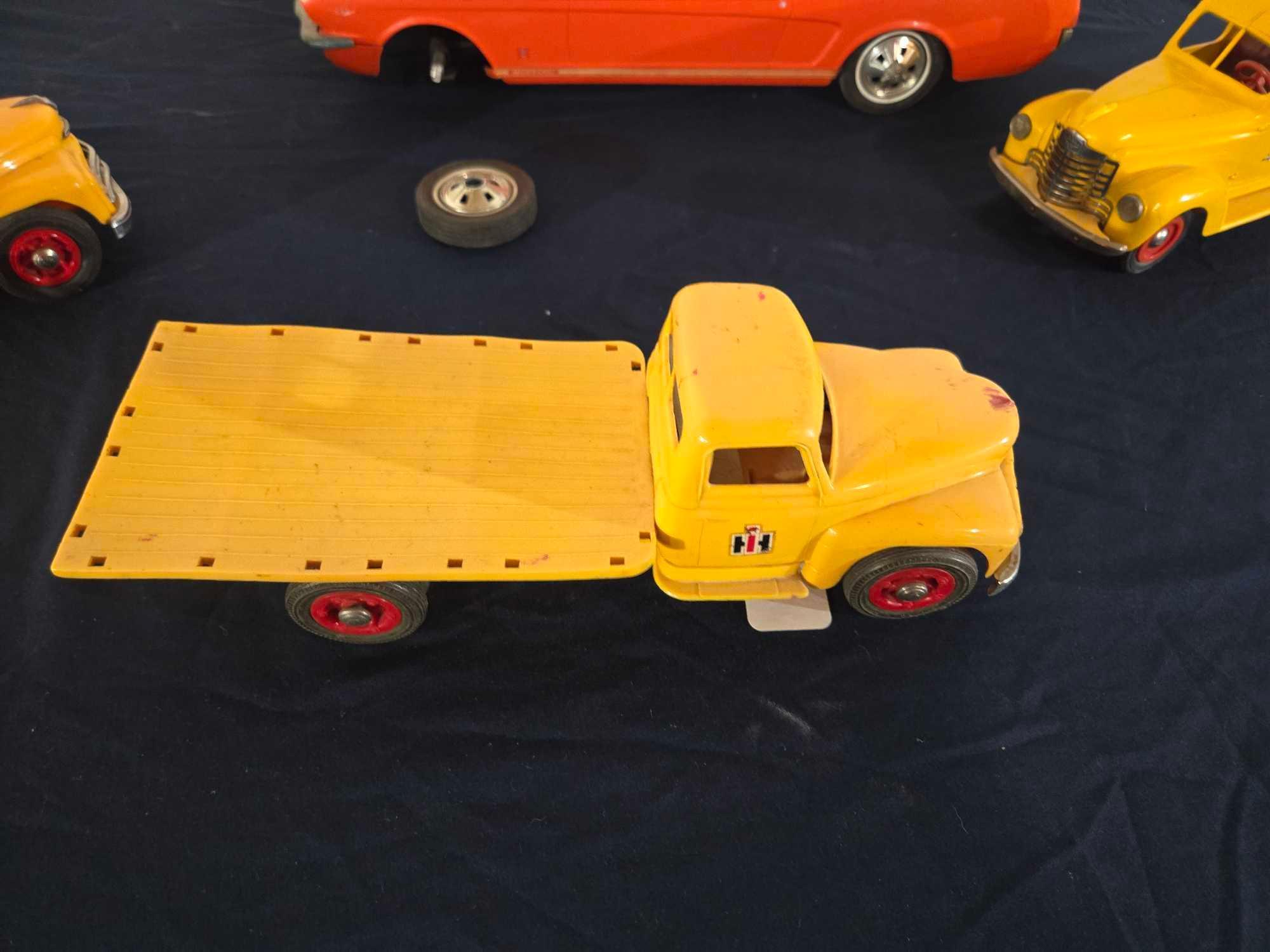 Assorted Toy Trucks and Car
