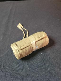 Antique canvas roll up sewing kit