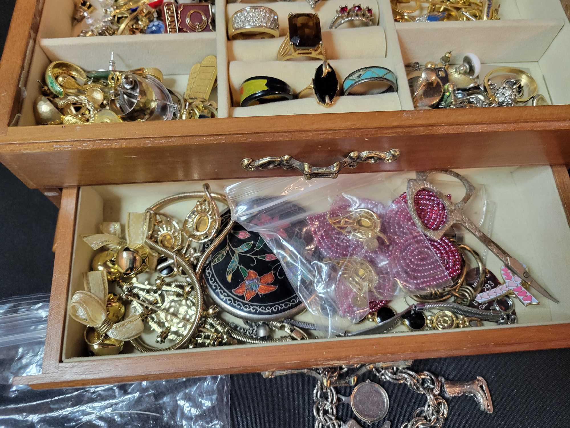 Box lot of assorted costume jewelry, bracelets, earrings, jewelry box and more