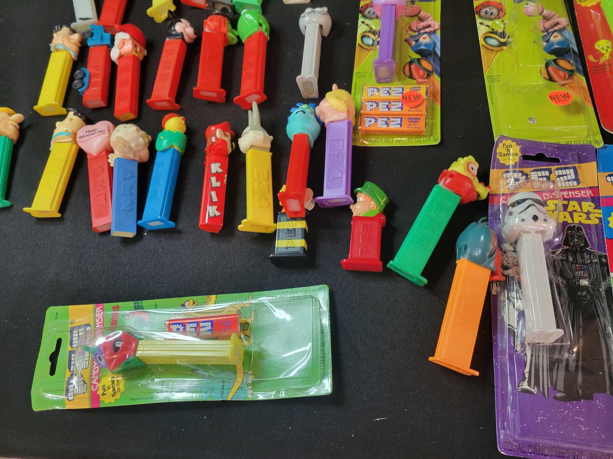 Large box of loose Pez and some in packs, Star Wars, Looney Tunes, Disney