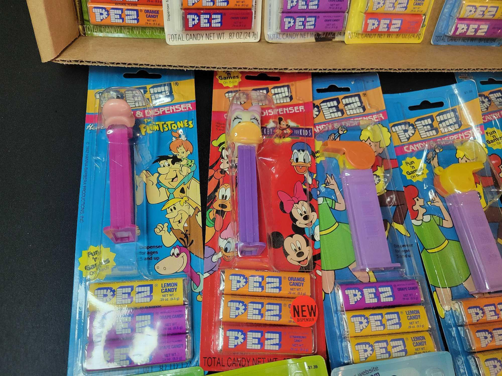 15 Pez dispensers in packaging