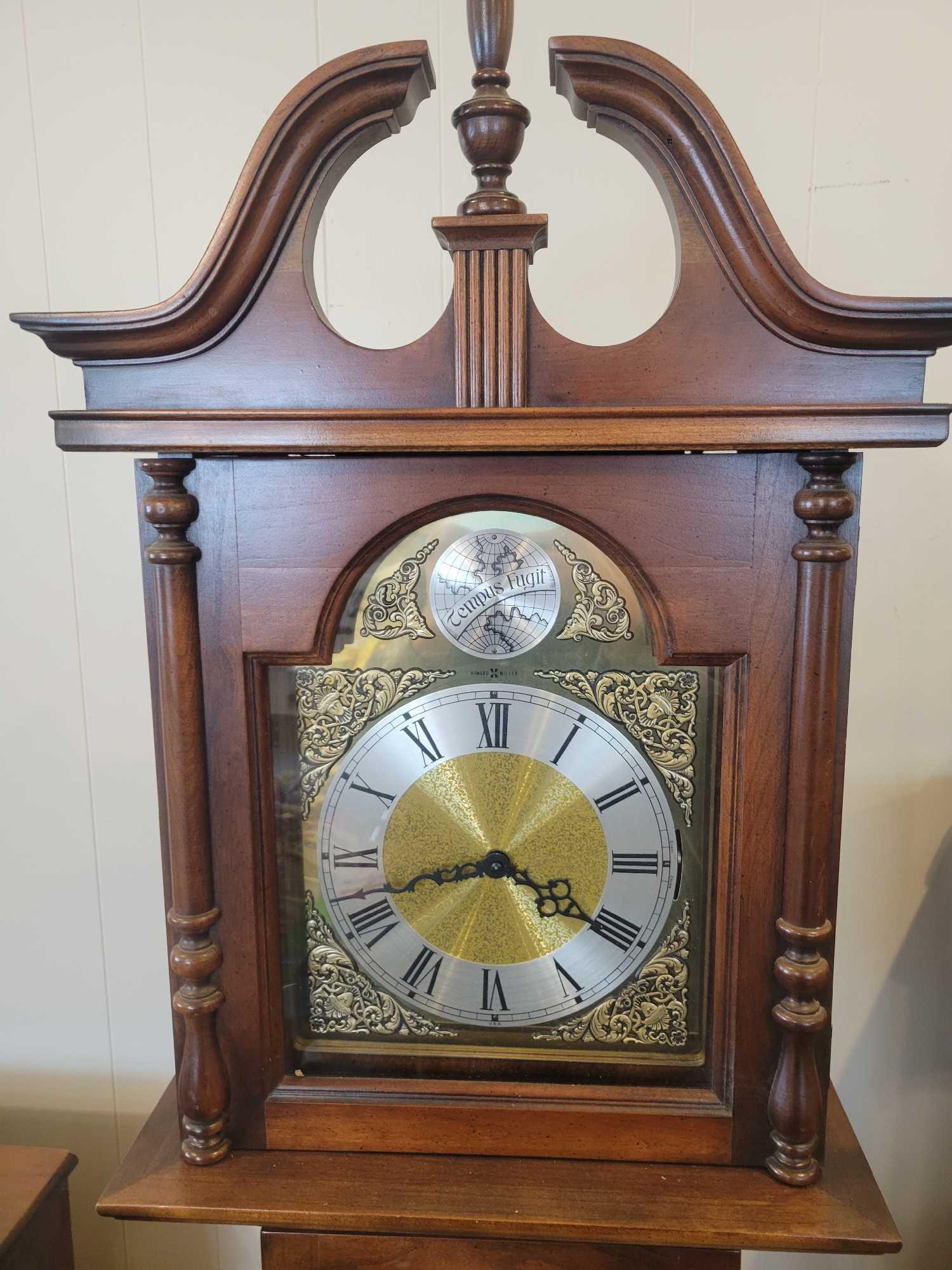 Howard Miller Tempus Fugit grandmother's clock with weights and pendulum