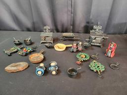 Vintage cast iron minature stoves, accessories, amish figures and trivets