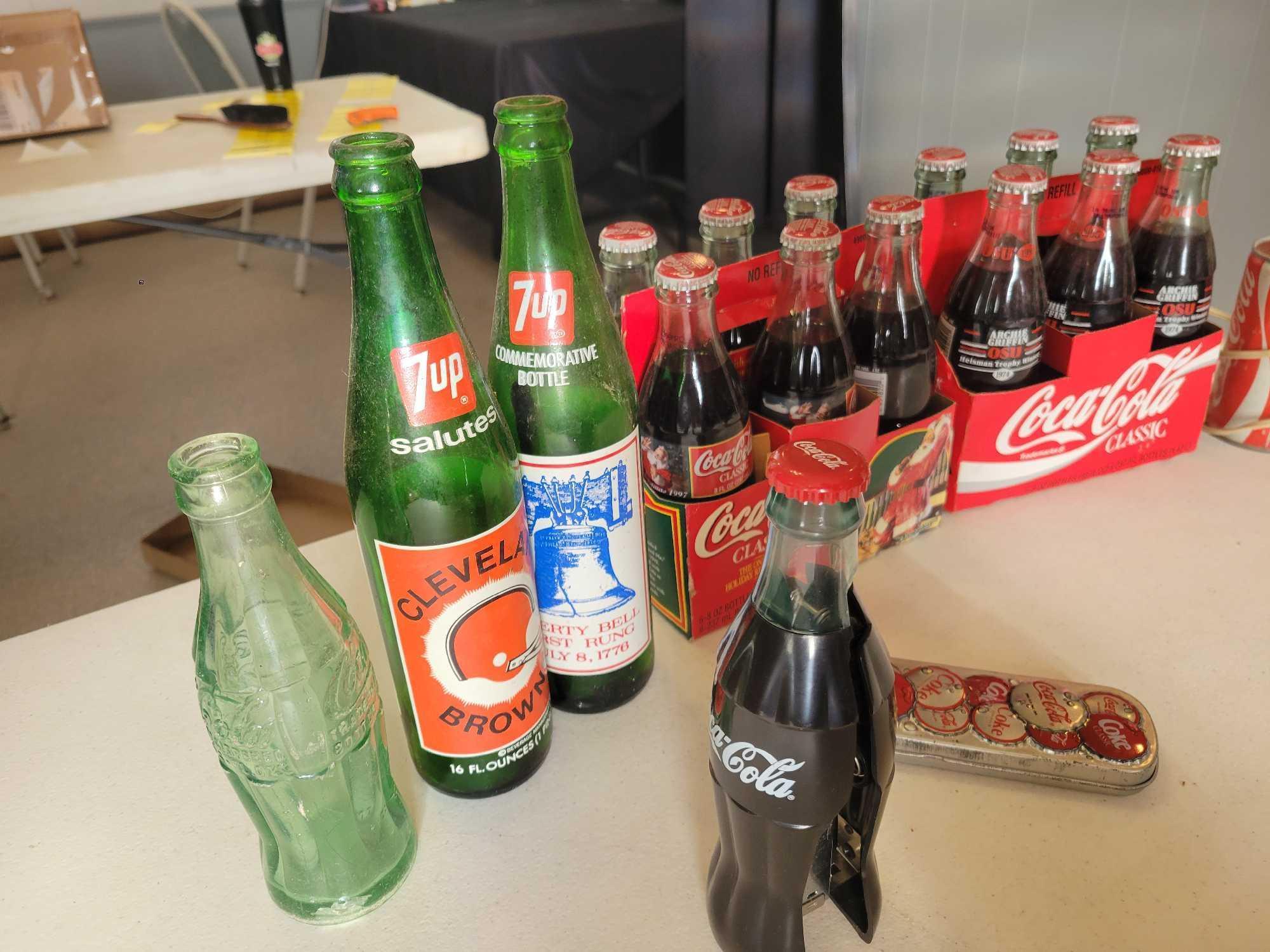 Collectible Coca Cola bottles, 7Up, Coke lamp and decor