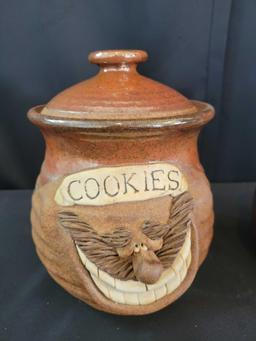 Pair of Robert Eakin pottery cookie jars