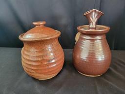 Pair of Robert Eakin pottery cookie jars