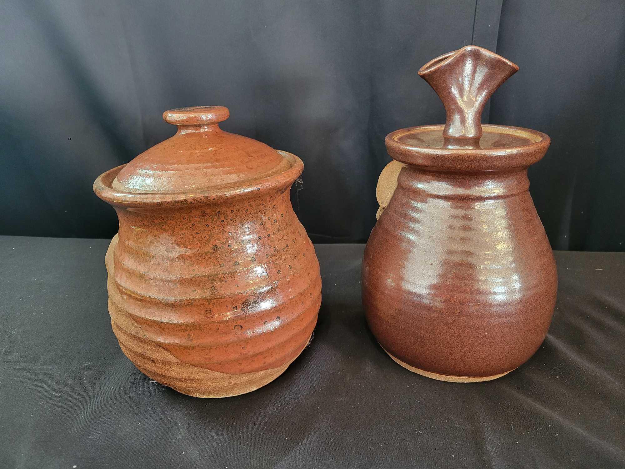 Pair of Robert Eakin pottery cookie jars