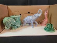 Assorted pottery planters and figurines