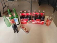 Collectible Coca Cola bottles, 7Up, Coke lamp and decor