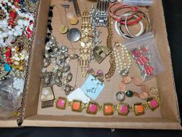 Group of assorted costume jewelry, pins, necklaces, brooches and earrings