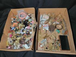 Group of assorted costume jewelry, pins, necklaces, brooches and earrings