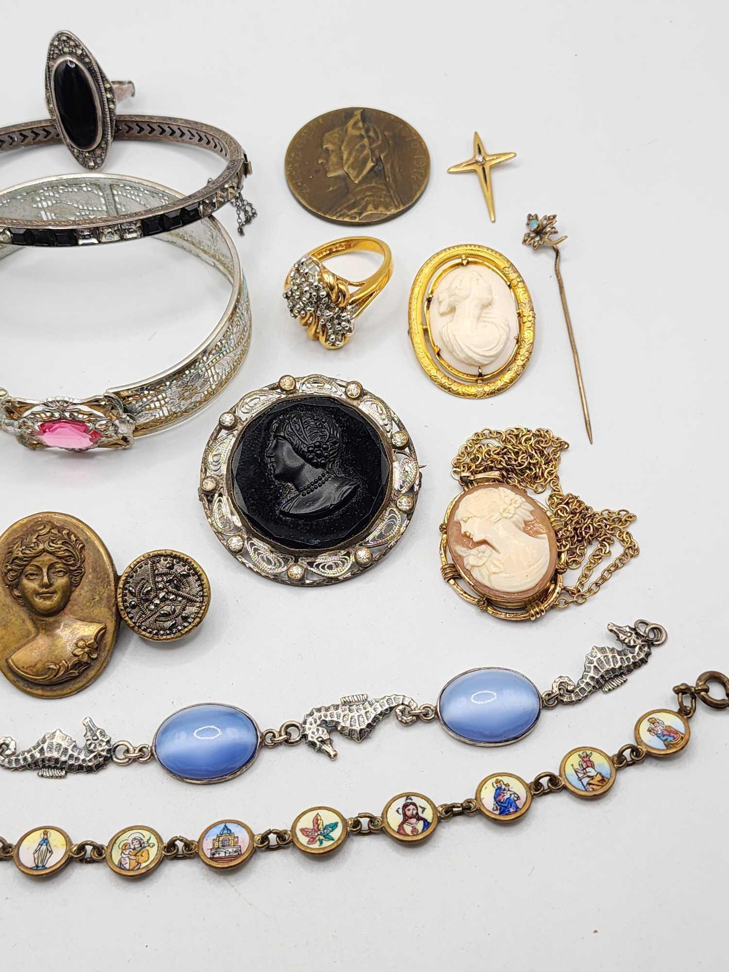 Antique Victorian jewelry: bracelets, pins, cameos