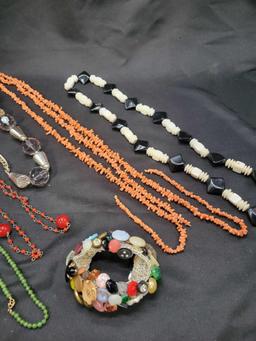 Lot of costume jewelry necklaces and button bracelet