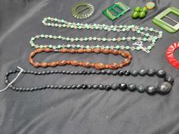 Vintage bakelite buckles, beaded necklaces