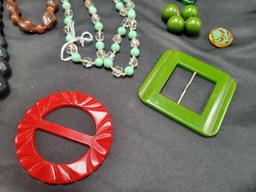 Vintage bakelite buckles, beaded necklaces