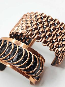 (2) vintage copper cuff bracelets