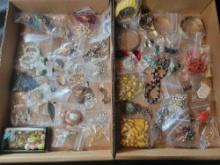 Group of assorted costume jewelry, pins, necklaces, brooches and earrings