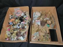 Group of assorted costume jewelry, pins, necklaces, brooches and earrings