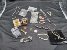 Group of costume jewelry, necklaces, earrings and more