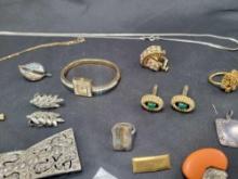 Group of earrings, costume rings and silver tone jewelry