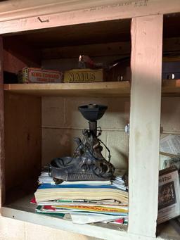 HOF beam bottle, early lamp and hardware in cupboard