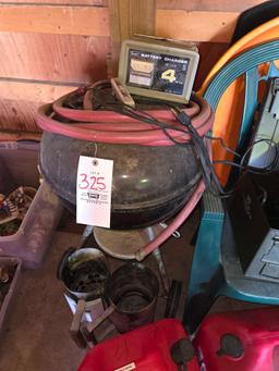 Gas Cans, Grill, Battery Charger, Plastic Patio Chairs