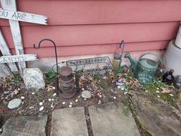 Contents Outside House Side Door - Glass Bottles, Lantern, & Outdoor Decor