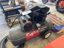 Dayton cast iron series air compressor.