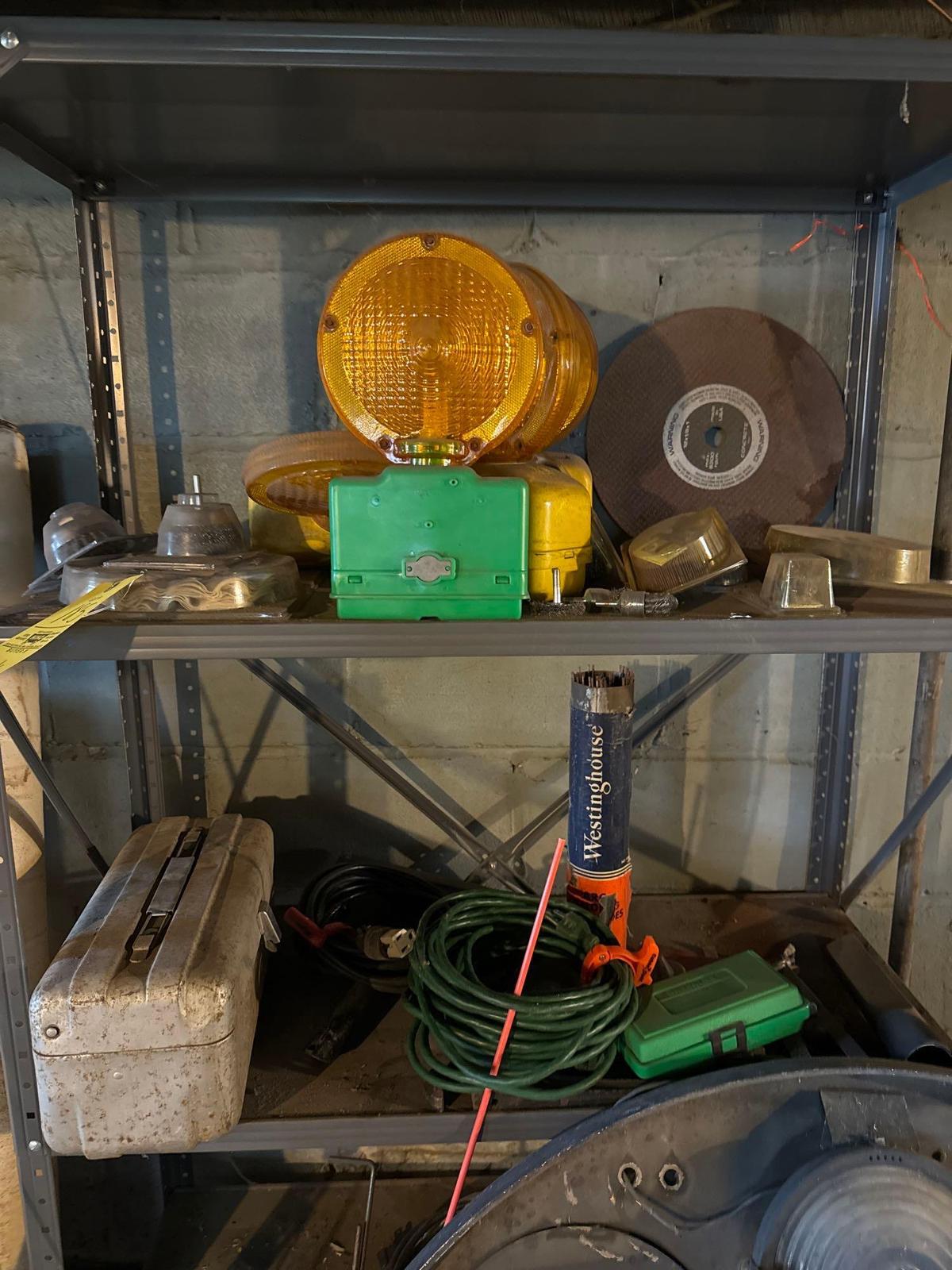 contents of metal shelf, lights, extension cords and more