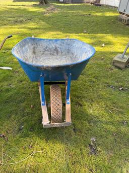 blue metal wheel barrow