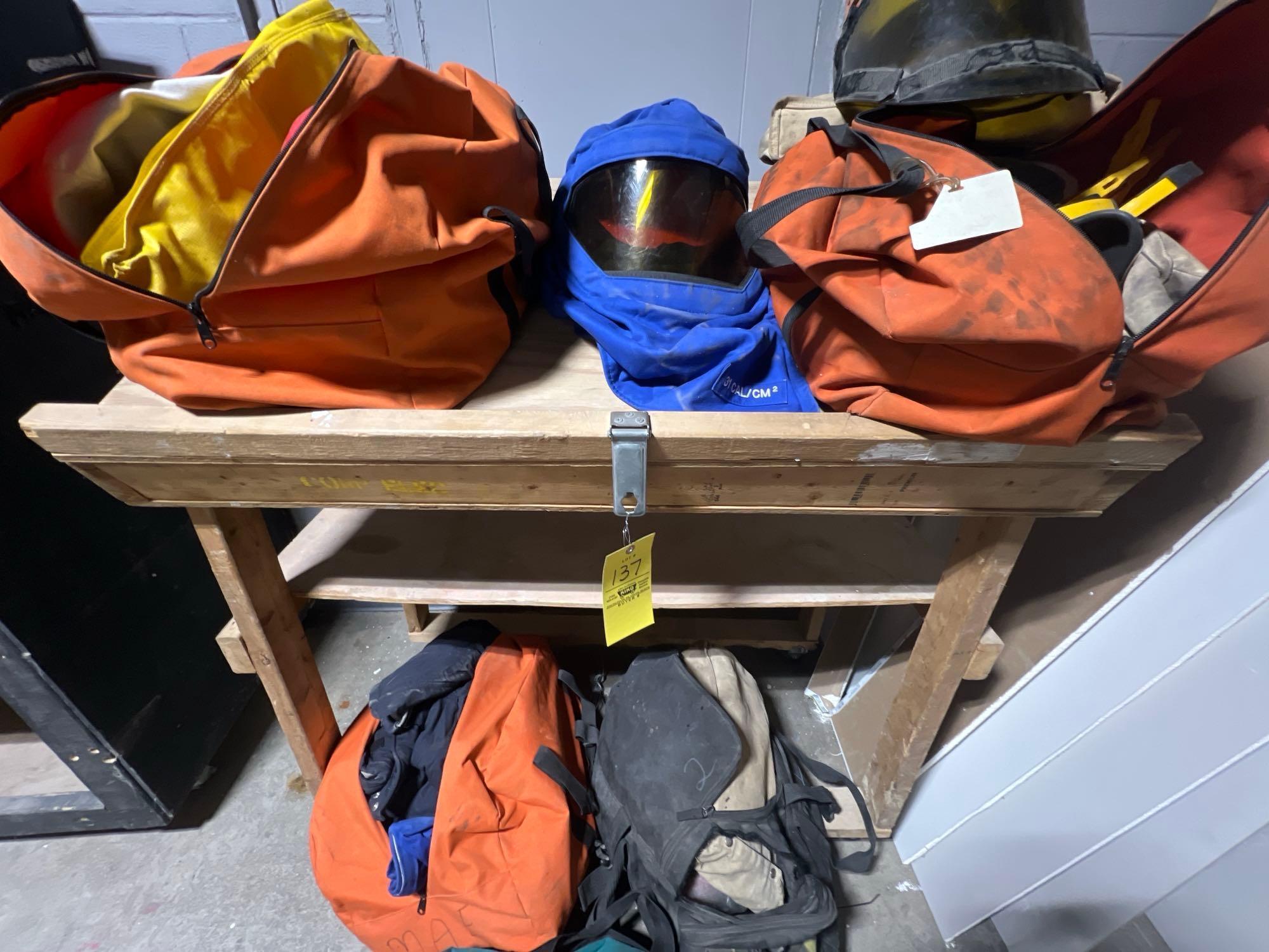 Lot Of Assorted Safety Helmets And Safety Clothes-Wooden Bench
