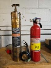 2 fire extinguishers, one old buffalo