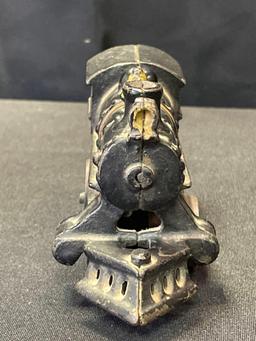 Cast iron toy locomotive, spring power not working, 6" long x 3" tall