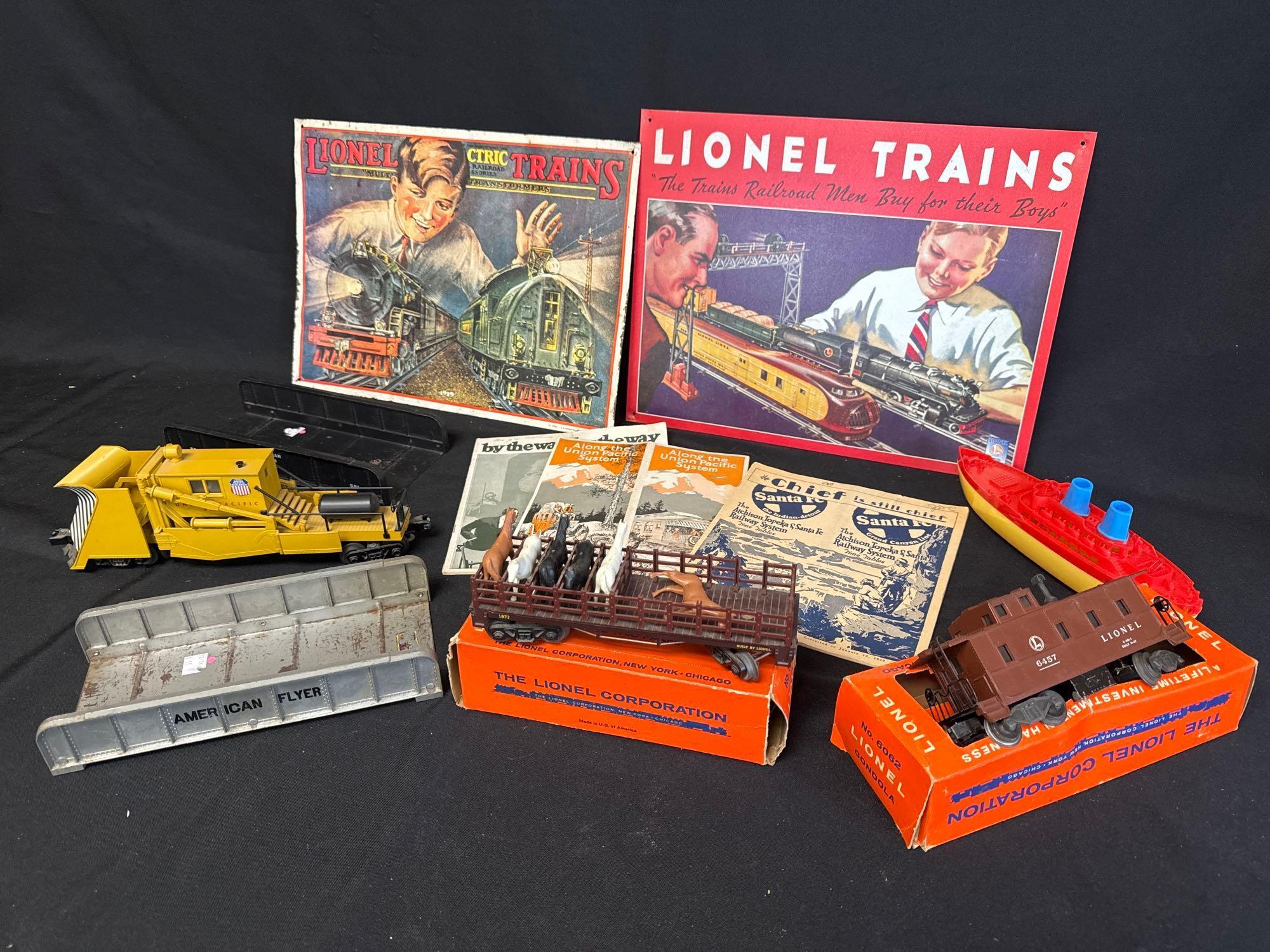 Lionel tin signs, paperwork, snow plow, flat car with horses and more! Great collectors grouping